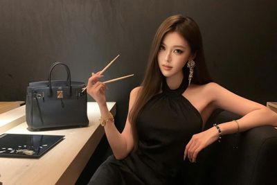 Dịch vụ bán ảnh 'phông bạt' giá 1.000 đồng nở rộ ở Trung Quốc