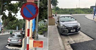 Ô tô Mitsubishi Attrage đỗ lề đường, đơn vị thảm nhựa mặt đường phải 'né xe'