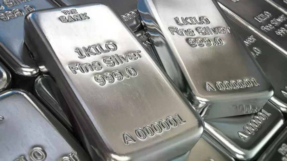 Giá bạc thế giới lần đầu tiên vượt mốc 77 USD một ounce
