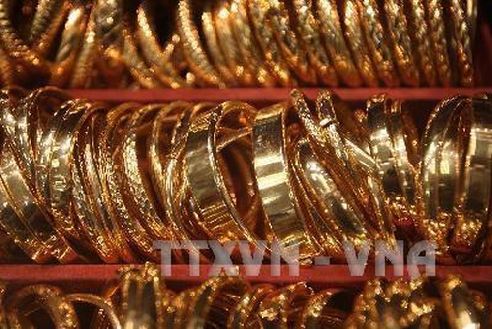Giá vàng tăng nhẹ khi đồng USD suy yếu