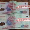 Tiền giả 200.000 đồng xuất hiện trở lại: Cách phân biệt để tránh bị lừa