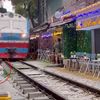 Thông tin ban đầu vụ cô gái ngồi cà phê đường tàu bị tàu hỏa hất văng điện thoại
