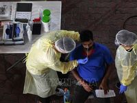 COVID-19 tại ASEAN hết 9/12: Lào có trên 1.000 ca mắc mới 3 ngày liền; Singapore thu phí bệnh nhân không tiêm vaccine