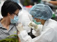 COVID-19 tại ASEAN hết 9/12: Lào có trên 1.000 ca mắc mới 3 ngày liền; Singapore thu phí bệnh nhân không tiêm vaccine