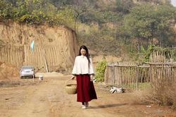 Chùm ảnh nữ văn sĩ Trung Quốc bỏ phố về quê
