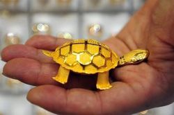 Giá vàng hôm nay 25-9: Chờ thời bứt phá tăng giá