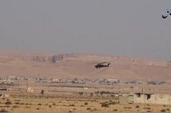 Trực thăng Nga phóng tên lửa 'nướng' xe tăng phiến quân Syria