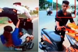 Nam thanh niên đứng 1 chân lái xe và bốc đầu liều mạng