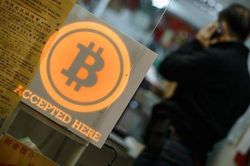 Bitcoin chạm mức 9.300 USD, cao nhất 13 tháng