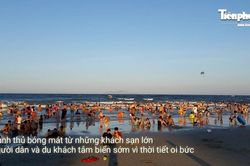 Nắng nóng đỉnh điểm, biển Đà Nẵng đông nghịt người giải nhiệt