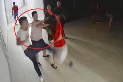 Nhóm người đánh hội đồng cô gái trẻ, truy đuổi 2 thanh niên