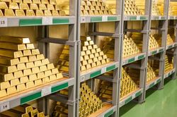 Vàng tăng giá do kỳ vọng vào tín hiệu từ Fed