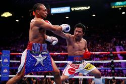 Pacquiao thắng Thurman sau 12 hiệp đấu tranh đai WBA