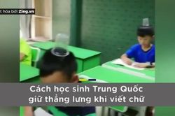 Cách học sinh Trung Quốc ngồi đúng tư thế, không bị gù lưng khi tập viết