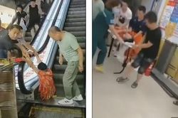 Liều đi thang máy hỏng, khách bị nghiến hai chân