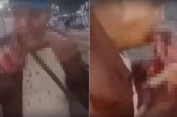 Người đàn ông gây phẫn nộ vì thản nhiên ăn thịt mèo sống giữa đám đông
