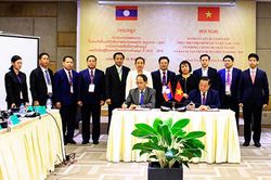 Ký kết thực hiện Hiệp định giữa Việt Nam - Lào về phòng, chống mua bán người