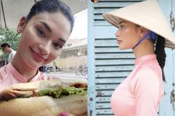 Hoa hậu Hoàn vũ Pia Wurtzbach mặc áo dài, đội nón lá ăn bánh mỳ ở Hội An