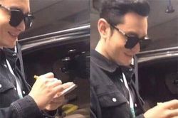 Đây là thái độ của Huỳnh Hiểu Minh khi được yêu cầu ký tên vào hình của Angelababy