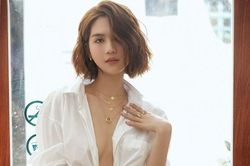 Ngọc Trinh diện áo sơ mi trắng lấp ló vòng một không nội y