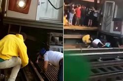 Bị bố lôi vào gầm tàu tự tử, cô bé 5 tuổi thoát chết trên đường ray