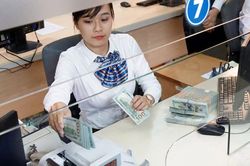 Ngân hàng Nhà nước lý giải vì sao không phá giá tiền đồng