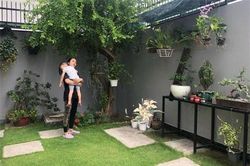 Ngắm căn biệt thự với sân vườn xanh mướt và ngập tràn tiếng cười của vợ chồng MC Ốc Thanh Vân