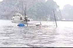 Tàu du lịch va tàu chở đá, chìm giữa vịnh Hạ Long