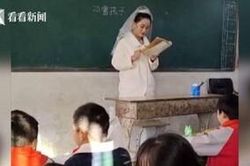 Cô giáo mặc váy cưới, đầu đội khăn voan đứng lớp dạy học trong ngày đưa dâu và lí do đặc biệt khiến ai cũng cảm động