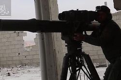 Phiến quân phóng tên lửa phá hủy căn cứ của quân đội Syria
