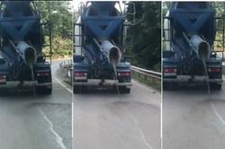 Xe trộn bê tông Bắc Á vừa đi vừa rải bê tông xuống Quốc lộ