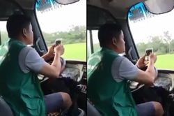 Thót tim với cảnh tài xế xe buýt vừa lái xe băng băng vừa lướt điện thoại