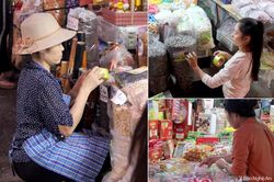 Tiểu thương chợ Vinh dán nhãn mác vào hàng hóa khi thấy lực lượng chức năng