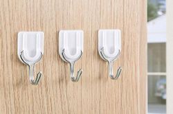 Chỉ cần làm điều này, móc dán tường dùng cả năm vẫn dính chắc như đóng đinh