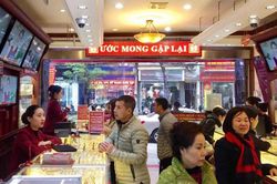 Có tiền đầu tư vàng hay bất động sản?