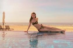 Lê Âu Ngân Anh mặc áo tắm khoe body mơn mởn không hổ danh hoa hậu có số đo đẹp nhất Việt Nam