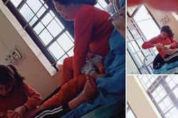 Hình ảnh con dâu cần mẫn ngồi cắt móng chân cho mẹ chồng trên giường bệnh khiến nhiều người xúc động