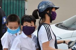 Cách dùng khẩu trang vải để chống virus corona
