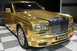 Xe siêu sang Rolls-Royce Phantom 'mạ vàng' làm… taxi