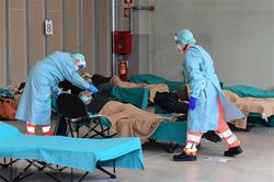 Dịch COVID-19: WHO xác nhận 2 nhân viên nhiễm virus SARS-CoV-2