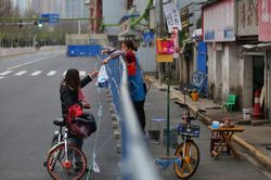 Hồ Bắc dỡ bỏ phong tỏa từ 25/3, Vũ Hán từ 8/4