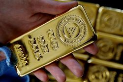 Giá vàng thế giới phiên 25/3 giảm do hoạt động mua quá mức trước đó