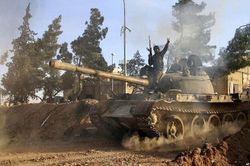 Phiến quân thân TNK tấn công dữ dội Quân đội Syria, gây thương vong