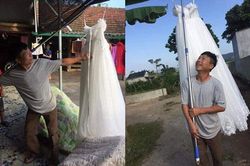Con gái 'thoát ế' thành công, bố treo hẳn váy cưới lên cao rồi đi khoe khắp làng khiến bao người hạnh phúc lây