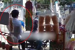 Giả vờ hỏi mua hàng, người đàn ông ôm thùng bia bỏ chạy