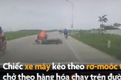 Thót tim xe máy ngã trước đầu ô tô