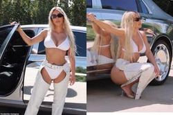 Kim Kardashian diện nội y khó hiểu thả dáng bên cạnh siêu xe