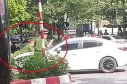 Hà Nội: Khởi tố, bắt tạm giam tài xế bỏ chạy, hất chiến sĩ công an lên nắp ca pô