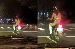 Phóng xe vù vù trên đường nhưng cô gái lại đội mũ bảo hiểm theo phong cách 'độc lạ' khiến ai cũng ngạc nhiên