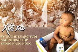 Xót xa bé trai 18 tháng tuổi trần truồng cả ngày ngoài đường bên tấm biển 'cháu không có bố mẹ' giữa nắng nóng 40 độ C ở Hà Nội